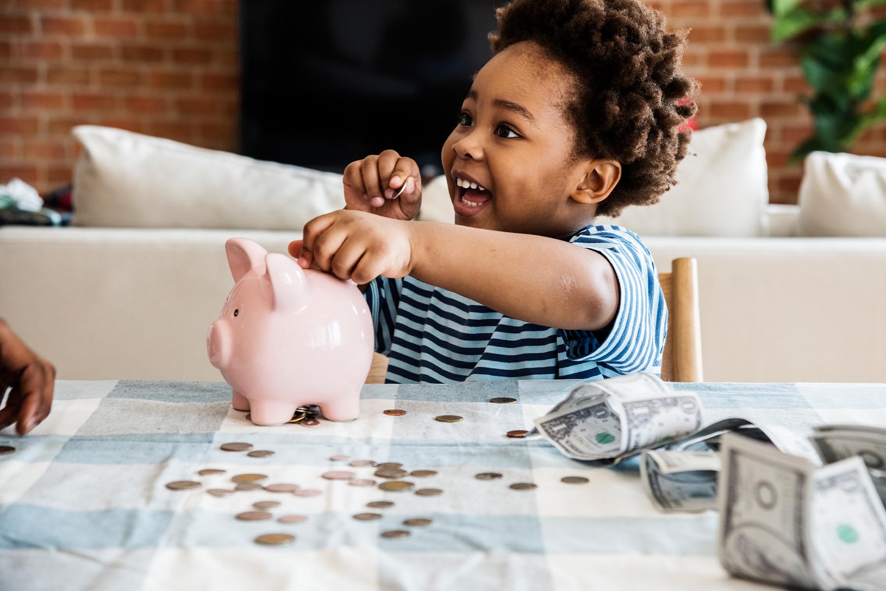 Teach Your Kids Better Money Habits With These 5 Savings Tricks