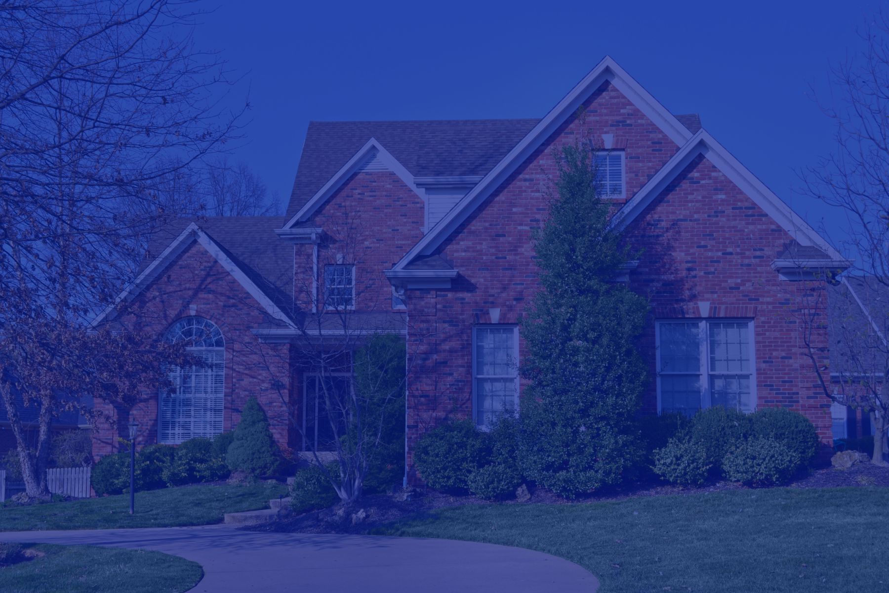 Picture of the outside of a large home with a Reflex blue overlay.